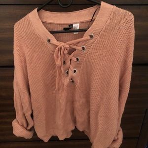 Pink knit criss cross sweater